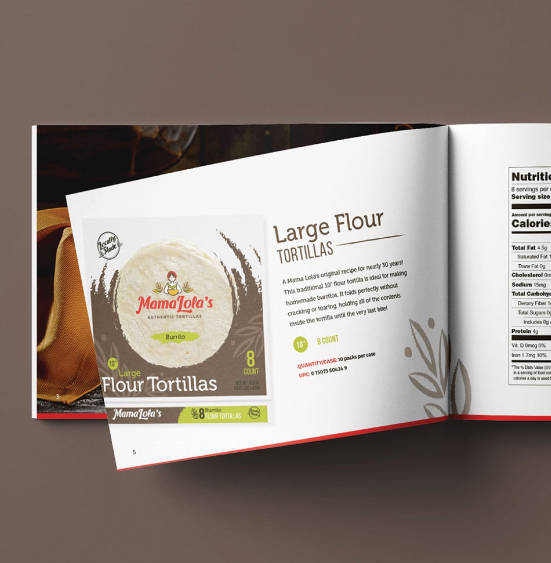 An open brochure displays Mama Lola's Large Flour Tortillas packaging and product description on a brown surface